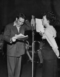 Burgess Meredith at the microphone during a Theatre of Today broadcast. LancasterHistory, Armstrong Archive