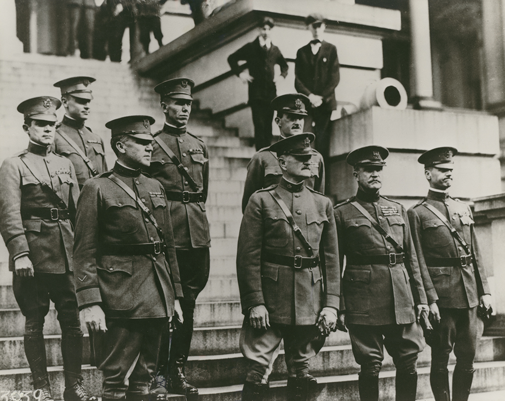 Marshall became aide-de-camp to General Pershing in 1919. In this photo of Pershing’s staff at the State, War and Navy Building in Washington, D.C., Marshall stands third from the left in the back row. Pershing is second from the left in the front row. Courtesy of the George C. Marshall Foundation, Lexington, Virginia
