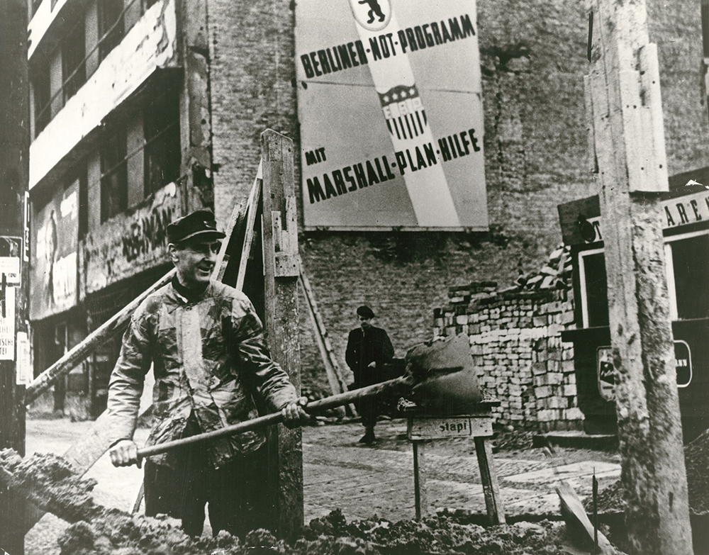 Low-cost housing was one the projects financed by the Marshall Plan. In this photograph, a German worker assists in laying a house foundation in Berlin. Courtesy of the George C. Marshall Foundation, Lexington, Virginia
