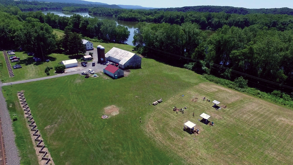 In this aerial view of Fort Halifax Park during the 2021 dig, archaeological excavation units can be seen in the lower right. Friends of Fort Halifax Park / Photo, Michael Brewer