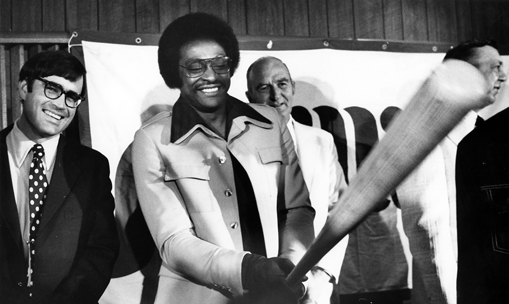 Phillies owner Ruly Carpenter, left, encouraged Allen to return to the team after Allen retired from the White Sox in 1974. This Philadelphia Evening Bulletin photograph was taken after Allen signed with the team on May 7, 1975. Longtime Phillies manager Paul Owens is behind Allen on the right. Special Collections Research Center, Temple University Libraries, Philadelphia, PA