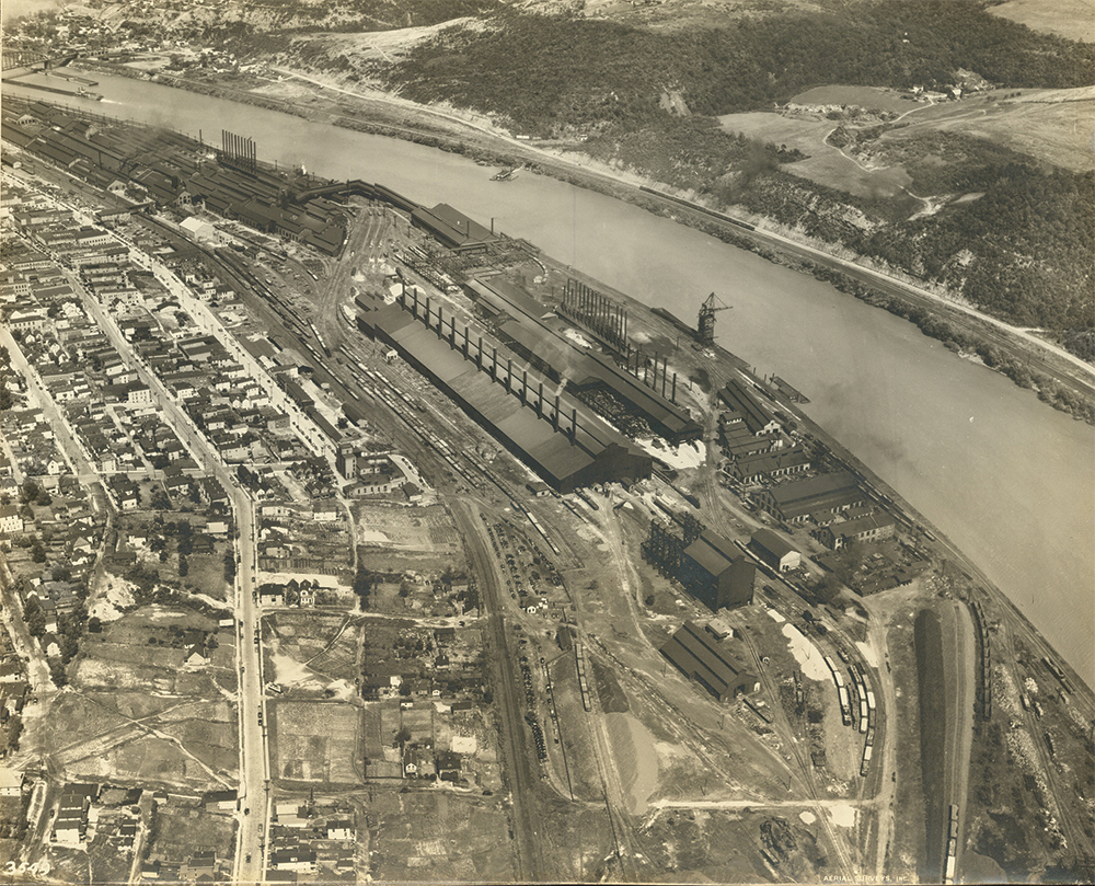 A mid-20th century aerial view of Donora and the industrial complex along the river. Donora Historical Society