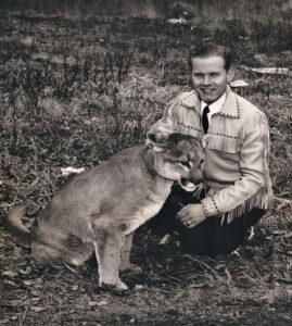 Animal trainer Leonard Kiser with his mountain lion, Jackson. Courtesy of the Shade-Central City Historical Society