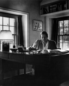 Pearl Buck working in her home office. Pearl S. Buck International Archives