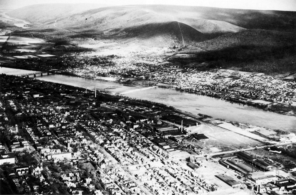 Williamsport, Lycoming County seat, once a significant lumbering center, did not escape Sam Kuhnert's camera lens. In fact, booming industry gave Williamsport the nickname of "Lumber City." Pennsylvania State Archives, MG-281