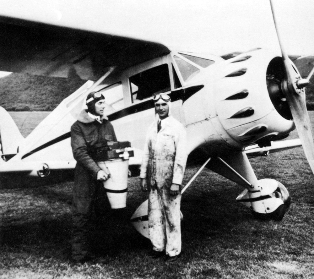 Friends John Abiuso and Sam Kuhnert, with camera, pose before a Waco YKA. Pennsylvania State Archives, MG-281