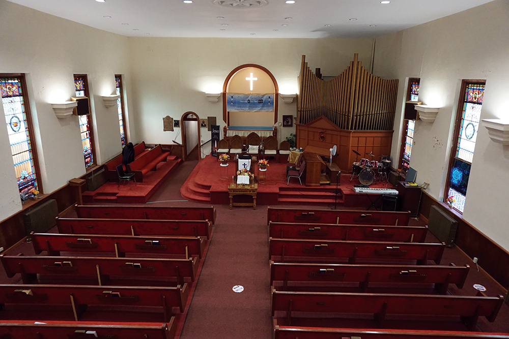 The sanctuary of the First Baptist Church is rectangular, true to the design of a Greek temple, as opposed to churches in Gothic and Romanesque styles that include a transept that shapes the sanctuary into the form of a cross. Photo, Pennsylvania State Historic Preservation Office