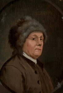 Benjamin Franklin as “the symbol of rustic democracy.” John Trumbull copied the image of Franklin in his famous fur cap from a black-and-white French print for this oil-on-wood color portrait in 1778. Yale University Art Gallery, John Hill Morgan Fund