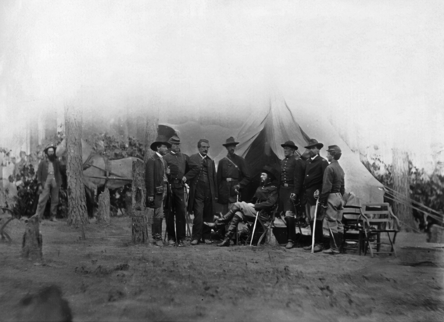 Crawford, seated, commanding the 3rd Division of the V Corps, meets with his staff in the field, circa 1864. The Medford Historical Society & Museum