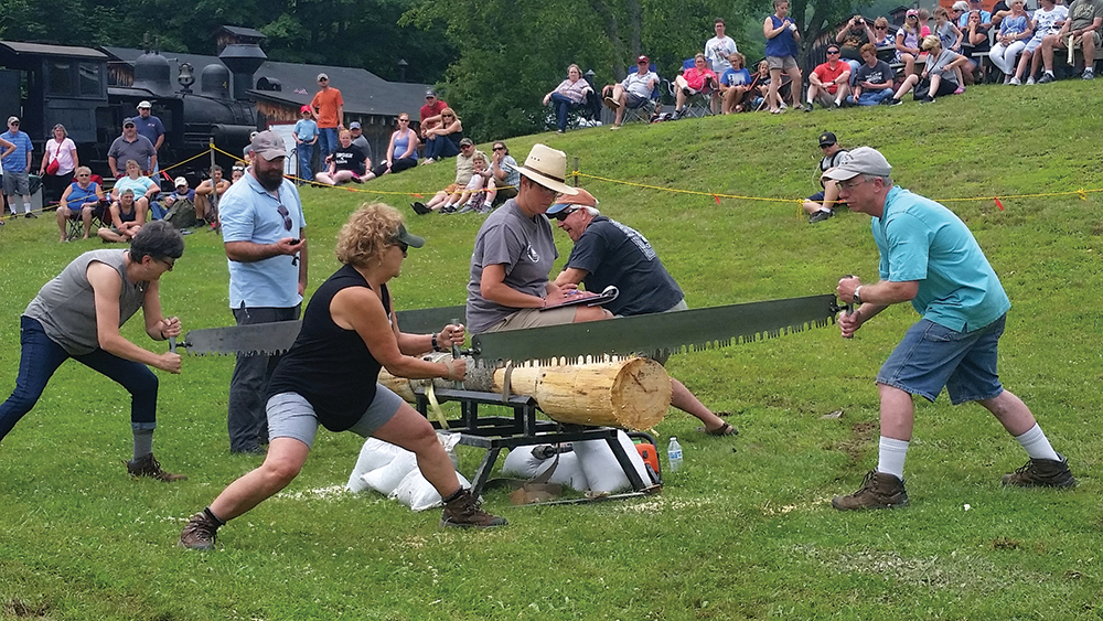 Men and women, young and old, novice and experienced competitors are encouraged to sign-up for the crosscut saw event; but the winning time is generally less than 30 seconds. Pennsylvania Lumber Museum, PHMC