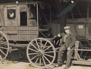 Here, Henry Landis poses with a mail coach from Perry County in 1953. By this time the land, buildings and collections of the Farm Museum had been transferred to the Commonwealth of Pennsylvania. Landis Valley Village & Farm Museum, Pennsylvania Historical & Museum Commission