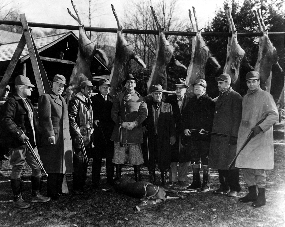 The Garner Pack poses during a hunting trip in St. Marys, Pennsylvania, in 1937. They are, from left, Sen. Harry S. Truman of Missouri, Sen. Clyde Herring of Iowa, Sen. Carl Hatch of New Mexico, Sen. George Radcliffe of Maryland, Polish ambassador Count Jerzy Potocki, Sen. Joseph Guffey of Pennsylvania, Col. William Kaul, Vice President John Nance Garner of Texas, Sen. Sherman Minton of Indiana, and Sen. James Murray of Montana. Harry S Truman Presidential Library