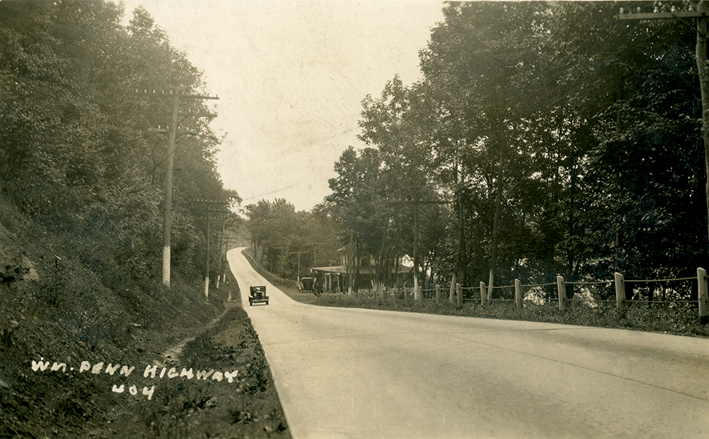 Concrete pavement was laid on the river route of the William Penn Highway in Perry County, one of the three hotly contested proposed alignments for the road. In the end, the highway followed the Juniata River, barely seen through the trees to the right. Collection of Dan Cupper