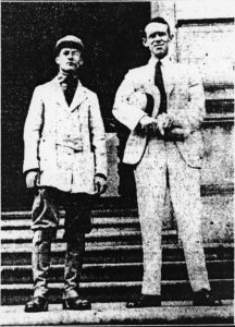 Francis X. O’Brien, left, poses on the Capitol steps in Harrisburg while on a 956-mile promotional hike from Philadelphia to Chicago to publicize the need for good roads. With him is Melville James, secretary of the William Penn Highway Association